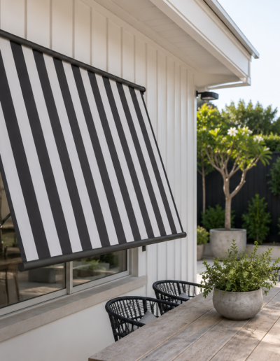 Striped pivot arm awning